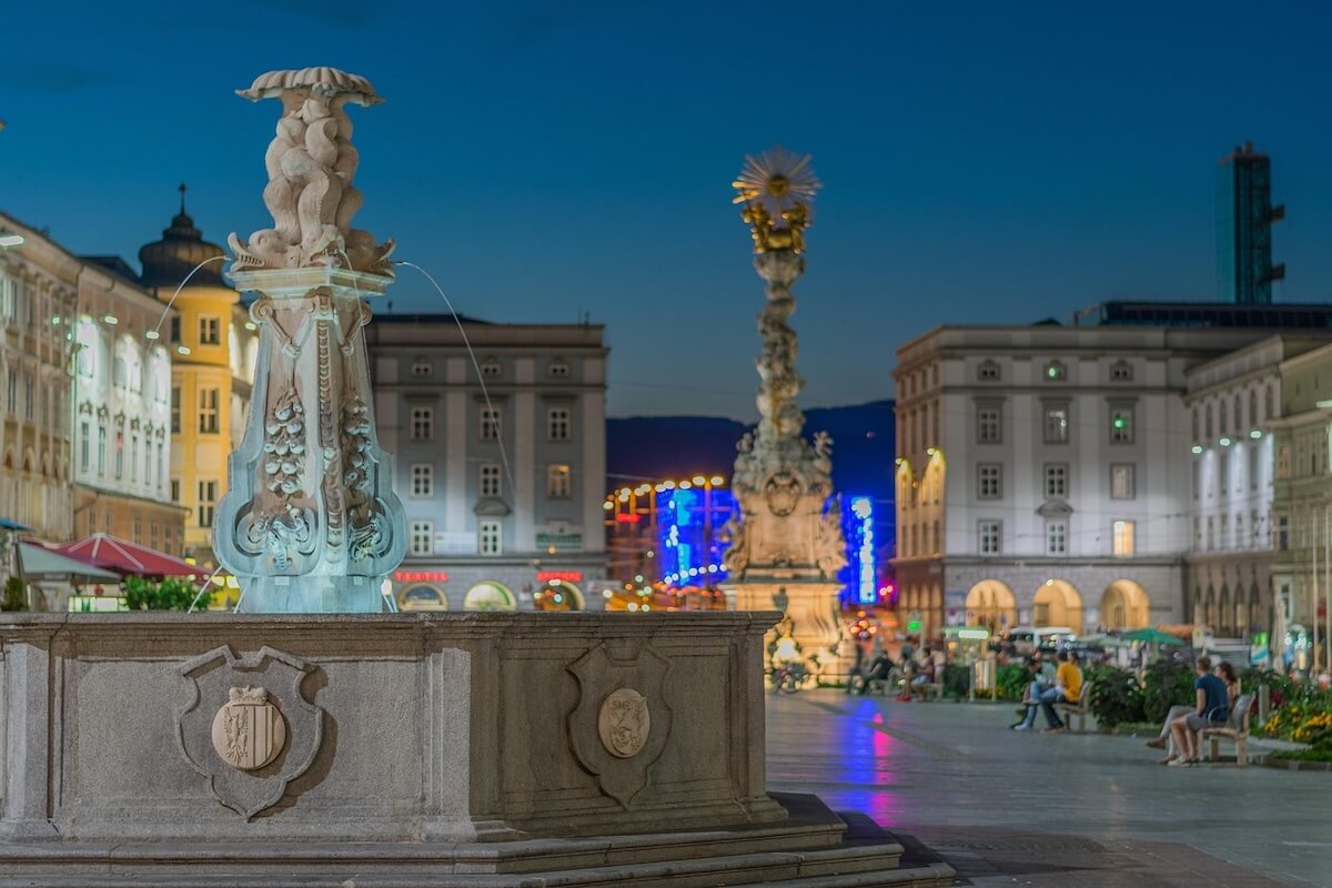 Fountain with evening atmosphere in the city center of Linz